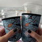 Teal Halloween Doodles Coffee Sleeves